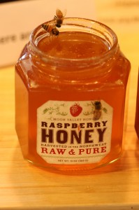 Photo of Bees enjoying a jar of honey