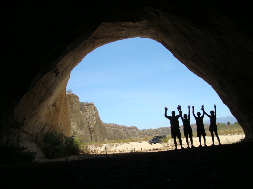 Mark, Judie, Doreen and Dewey exploring a cave far out in the desert.