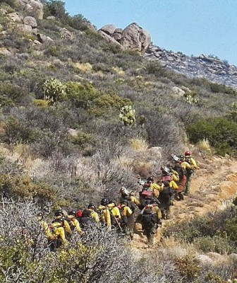 Granite Mountain Hotshots hike to the Yarnell Hill Fire, the morning of June 30, 2013. Photo by Joy Colura.